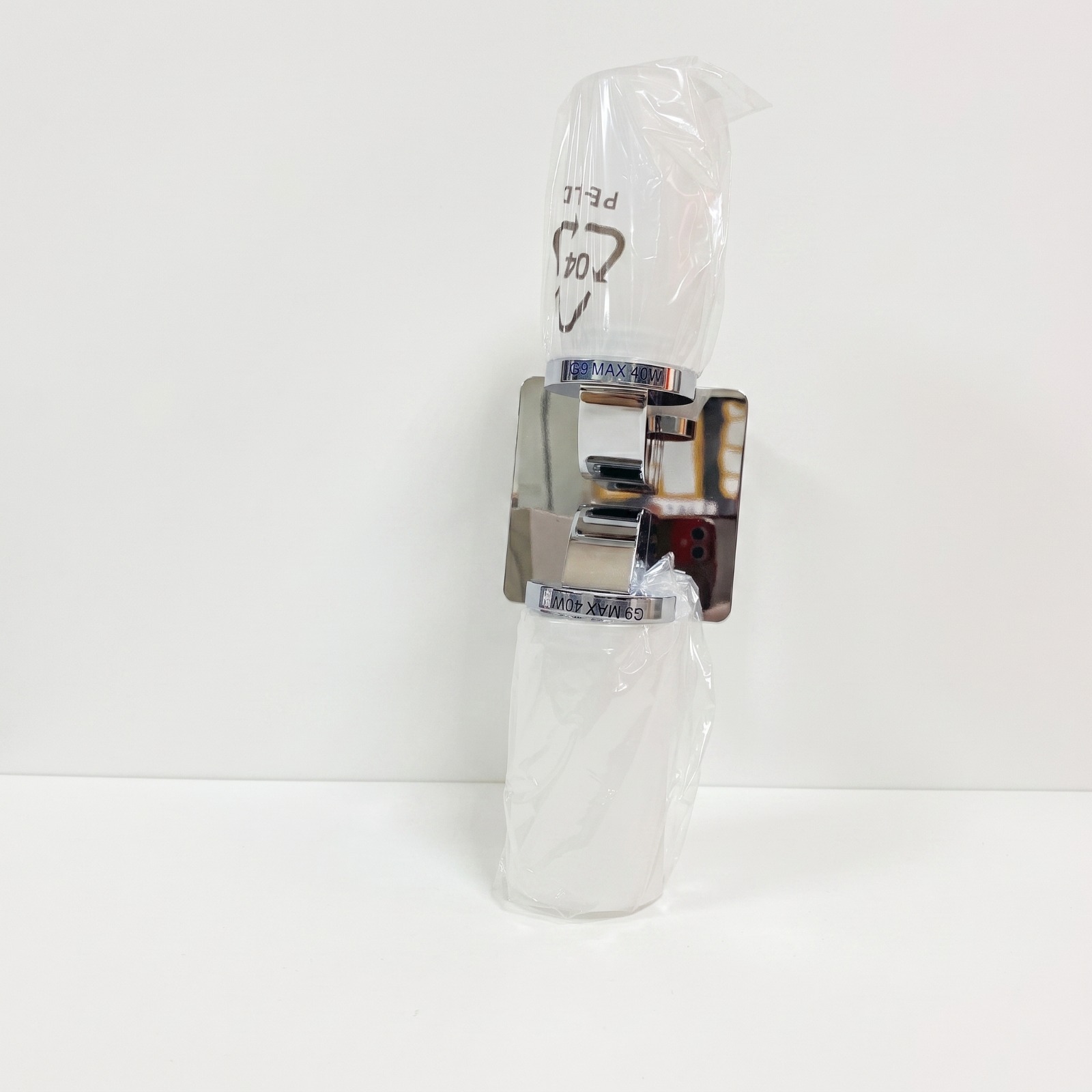 Aplique de pared cromado con doble G9